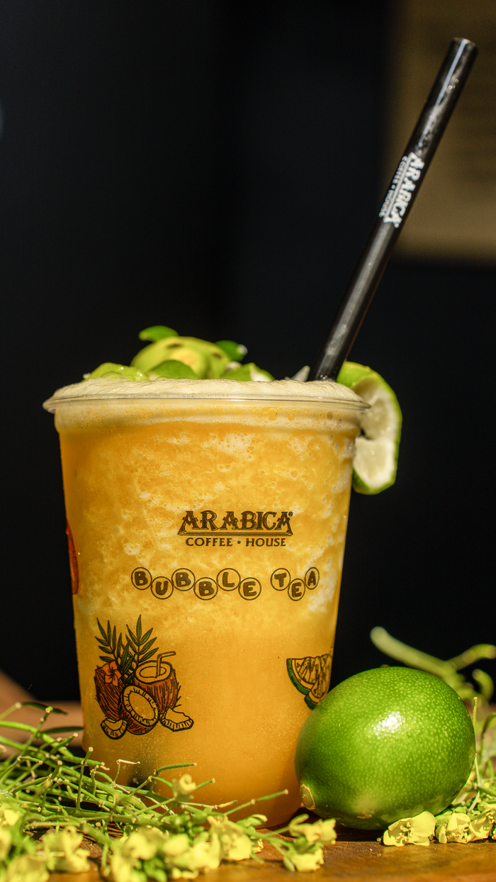 services-02 Delicious tropical-flavored bubble tea with lime garnish. Perfect for a refreshing drink.